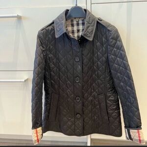 Burberry Black Quilted Button-Front Puffer Jacket with Check Cuff Detail
